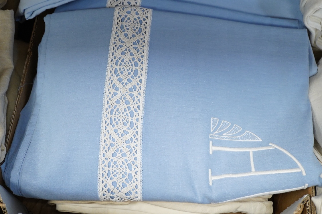Thirteen mixed French mostly coloured provincial linen sheets some embroidered with monograms, floral embroidery, or decorated with crochet.